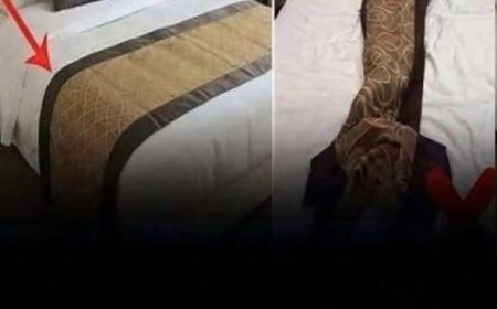Welchen Zweck hat der Stoffstreifen über den Hotelbetten